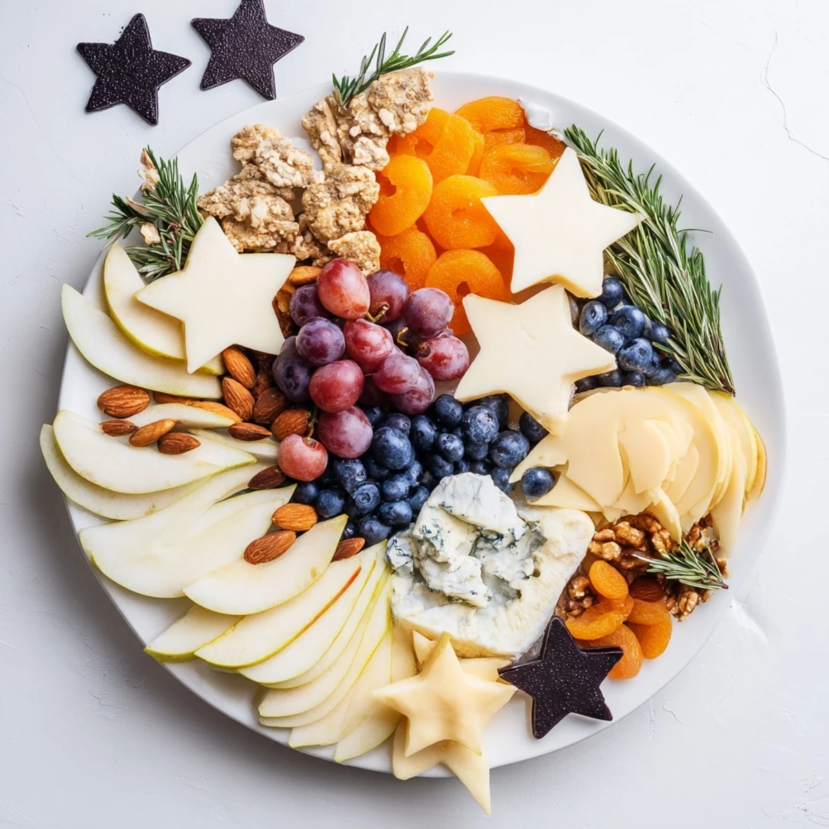 Magical Moon & Stars Night Board: a cheese and fruit grazing board with star and moon shapes.