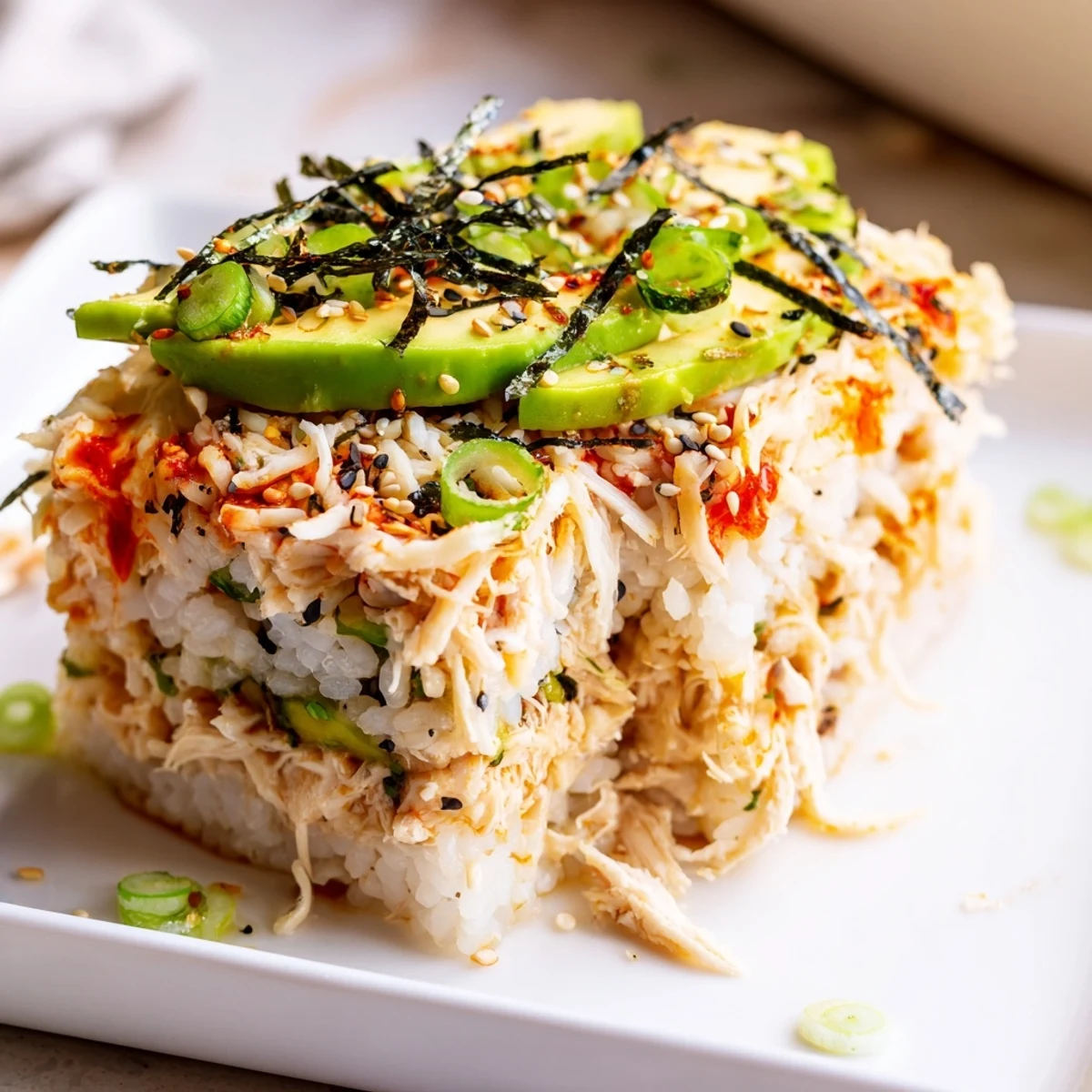 Golden-brown Chicken Sushi Bake casserole, a savory fusion dish, perfect for sharing and serving.