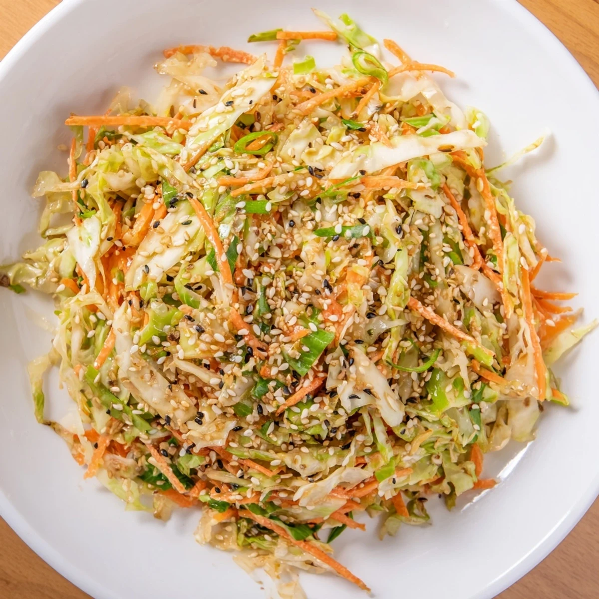 Crisp Cabbage-Core Slaw Salad, a colorful mix with toasted seeds and sesame dressing.