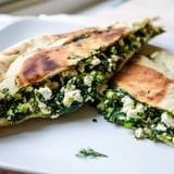 Savory Turkish Spinach & Feta Flatbread, featuring a crispy golden crust, showcasing a delicious cheese filling.