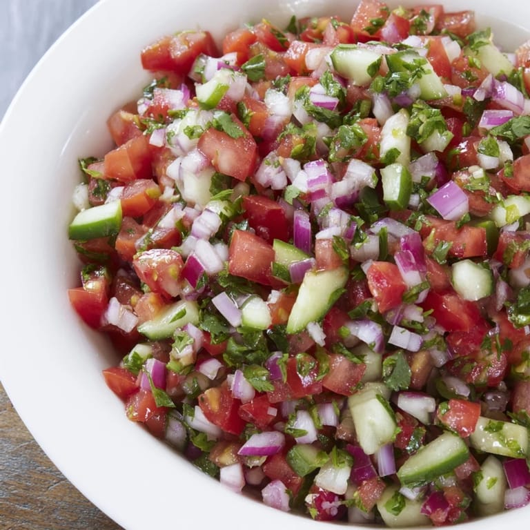 Bright lime juice enhances the flavors of this pickled cucumber pico de gallo, ideal for tacos.