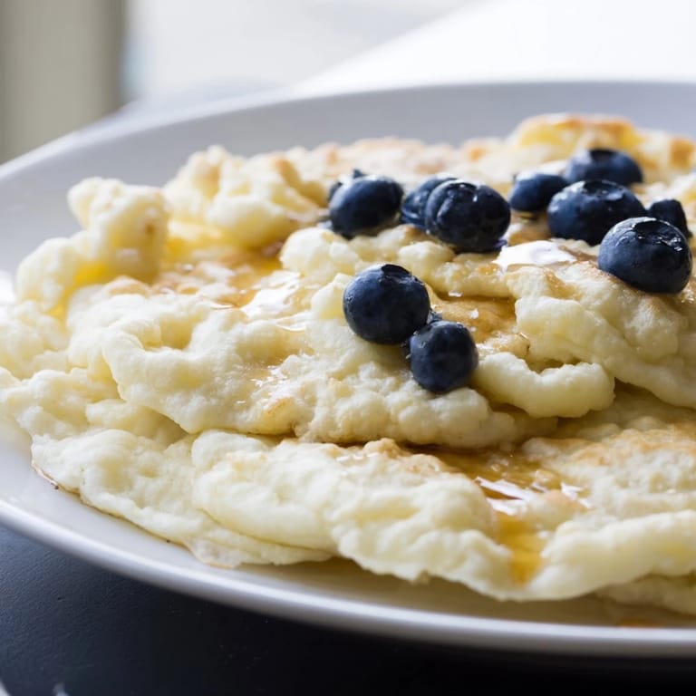 One-bowl fluffy scrambled pancakes, lightly golden and inviting, waiting for your favorite toppings.